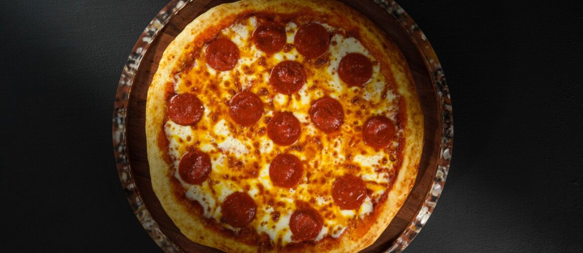 Pepperoni and sausage pizza fresh from the oven at Roma Pizza Donair
