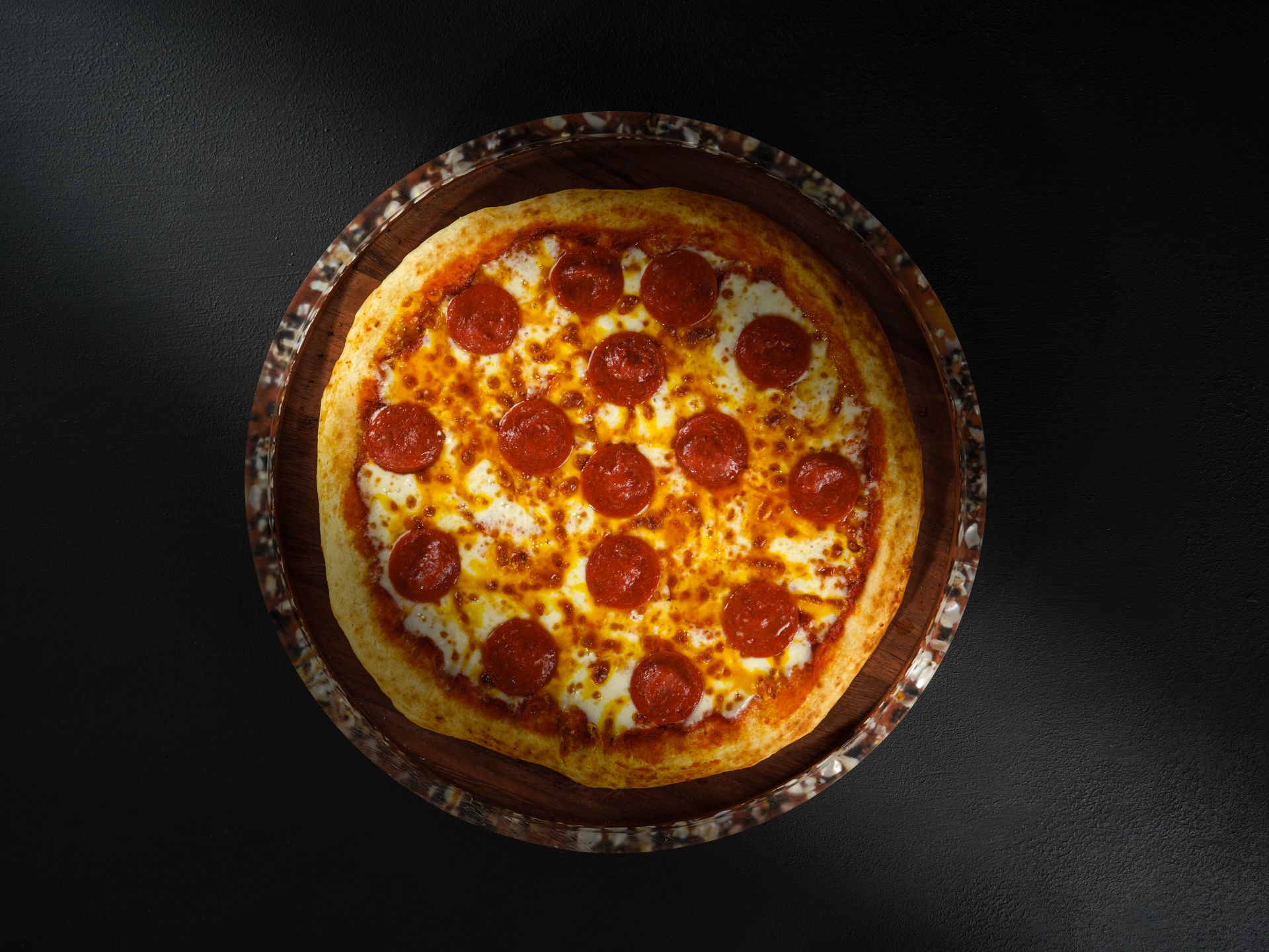 Pepperoni and sausage pizza fresh from the oven at Roma Pizza Donair